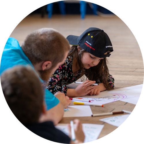 Father Holding Son on a Skateboard